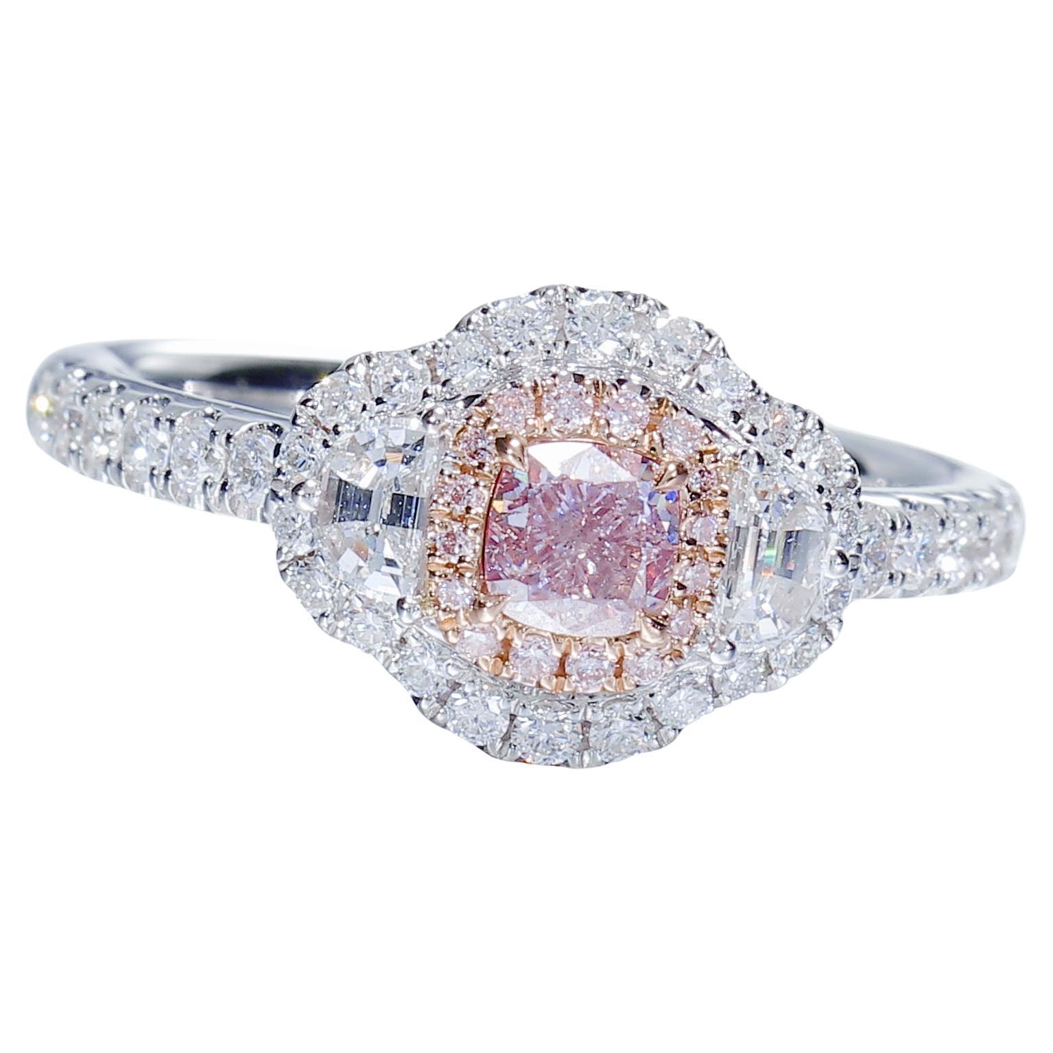 Fancy pink cushion diamond ring in sunlight