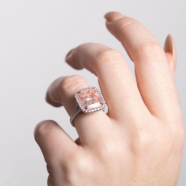fancy pink cushion diamond on hand